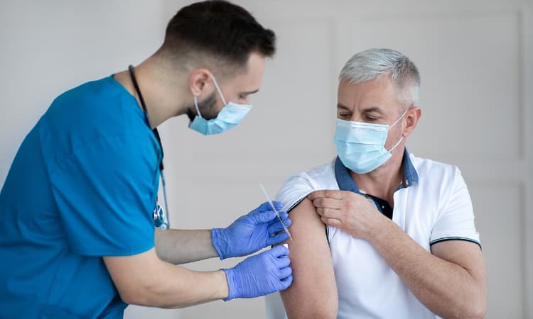 How does Germany's vaccination rollout compare to the rest of the world?