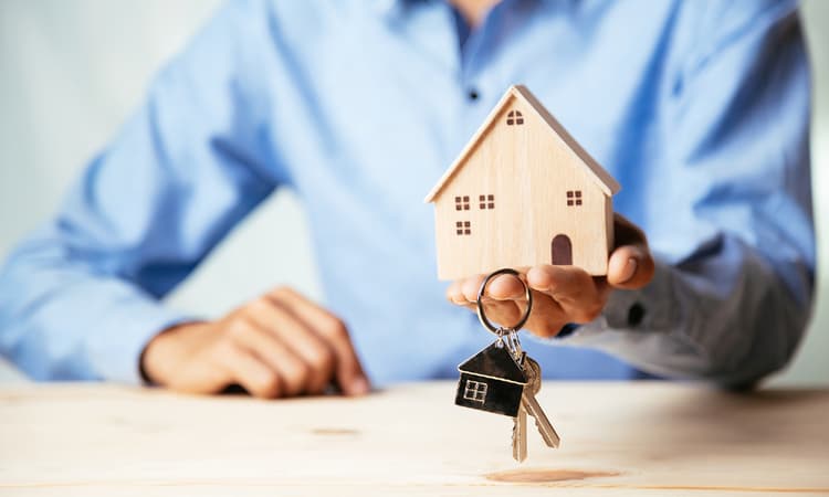 How can investing in real estate help secure your money against inflation? 