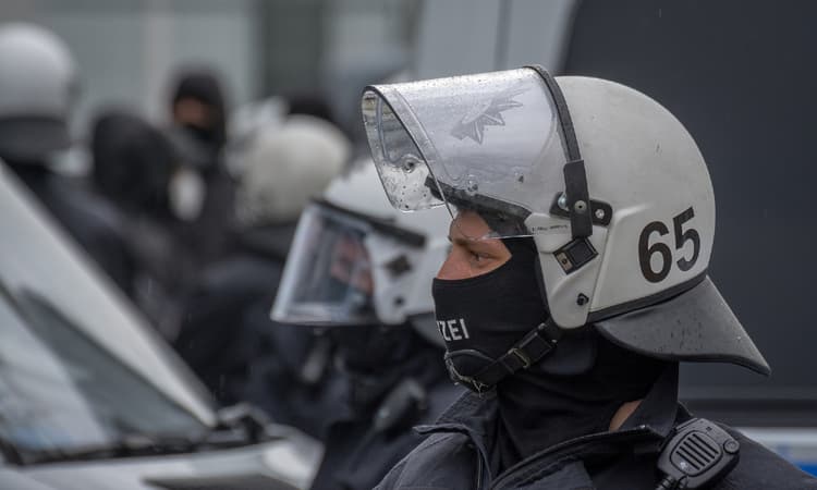 Arrests and injuries as thousands protest COVID rules across Germany